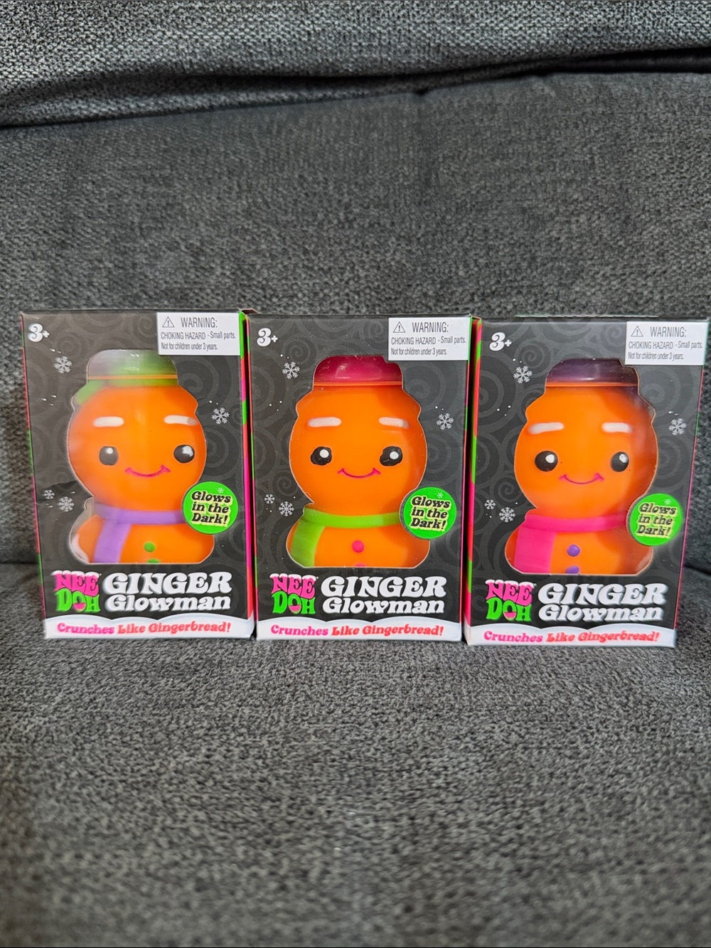 NeeDoh ULTRA RARE Ginger Glowman Squishmas Toy Orange with Pink, Green & Purple